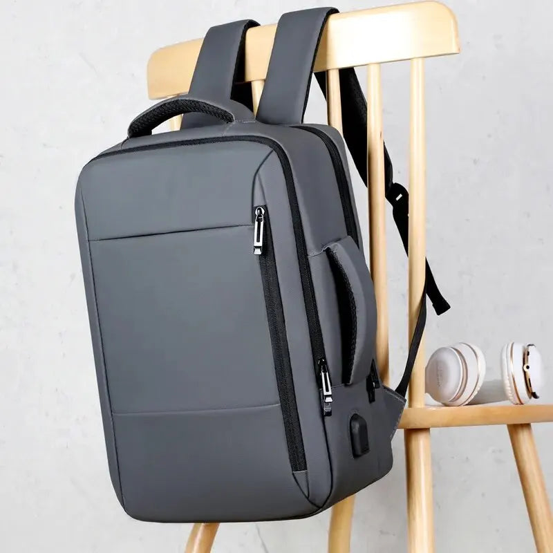 Ergonomic Men's Laptop Travel Backpack with USB Charging, slides onto Suitcase